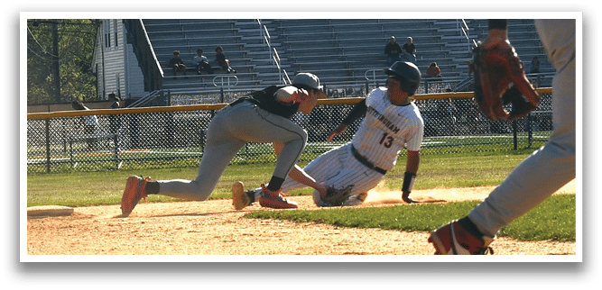 A baseball player slides into a base. Description generated by AI