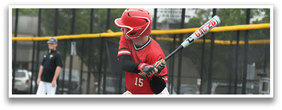 A baseball player in a red shirt and white pants is swinging a bat. Description generated by AI