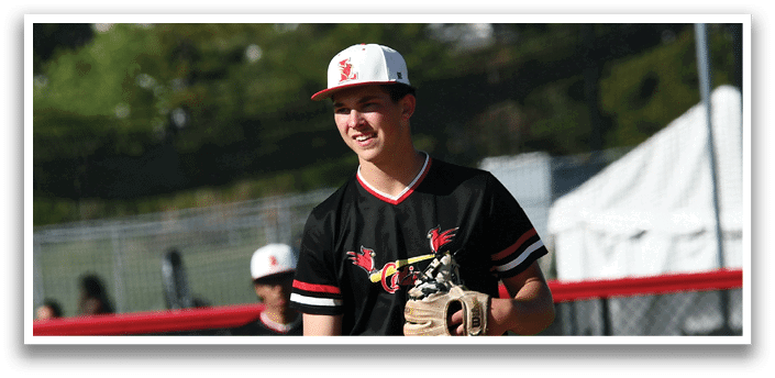 Two baseball players wearing black jerseys and helmets. Description generated by AI