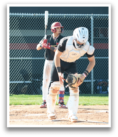 A baseball player wearing a white helmet and white pads. Description generated by AI