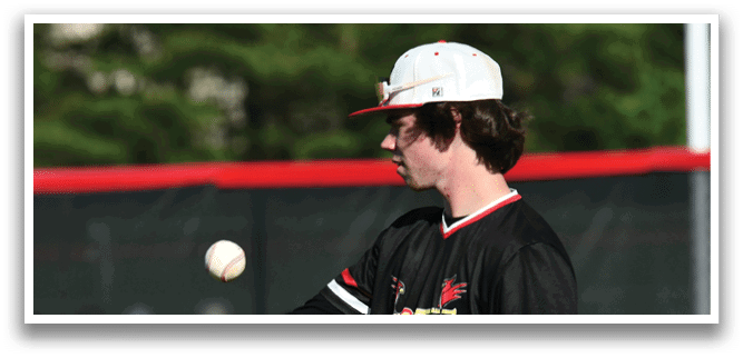 A baseball player wearing a black shirt and white pants is throwing a ball. Description generated by AI