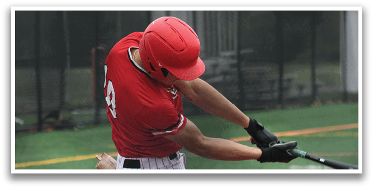 A baseball player wearing a red helmet and white pants is swinging a bat. Description generated by AI