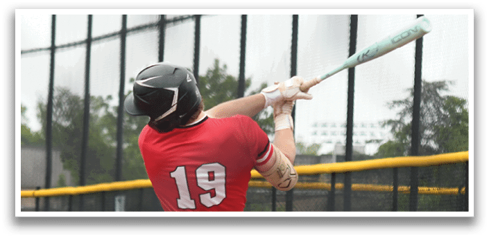A baseball player is swinging a bat at a ball. Description generated by AI