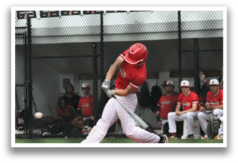 A baseball player in a red shirt and white pants is swinging a bat. Description generated by AI