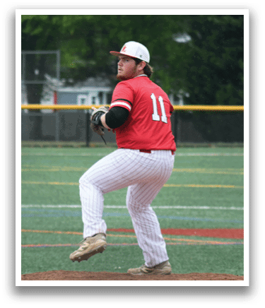 A baseball player wearing a red shirt and white pants is pitching a ball. Description generated by AI