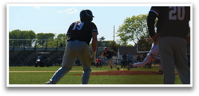 A baseball player is running to a base. Description generated by AI