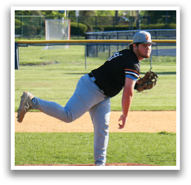 A baseball player is pitching the ball. Description generated by AI