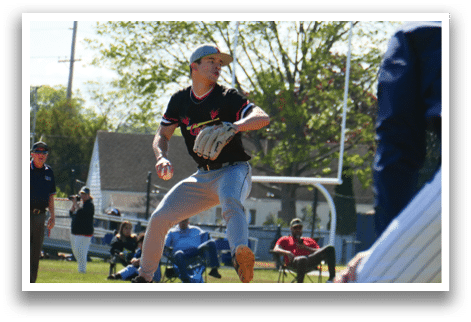 A baseball player is pitching a ball. Description generated by AI