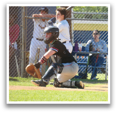 A baseball player is kneeling in front of home plate. Description generated by AI