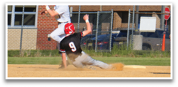 A baseball player sliding into a base. Description generated by AI