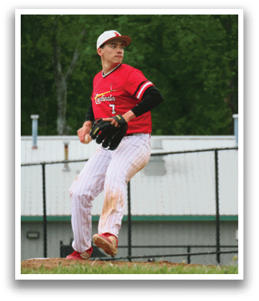 A man in a red shirt and white pants is throwing a baseball. Description generated by AI