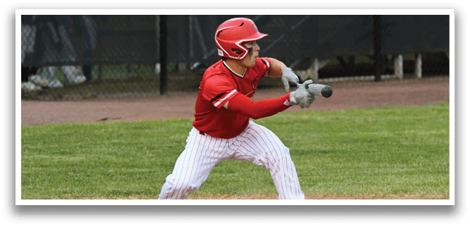 A baseball player in a red shirt and white pants is swinging a bat. Description generated by AI
