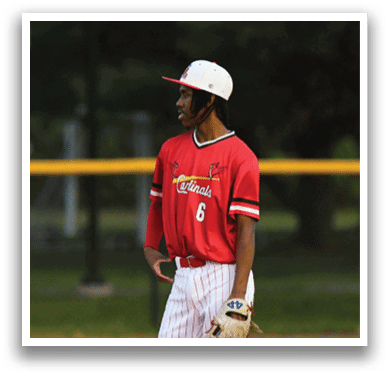 A baseball player wearing a red and white uniform with the number 6 on it. Description generated by AI