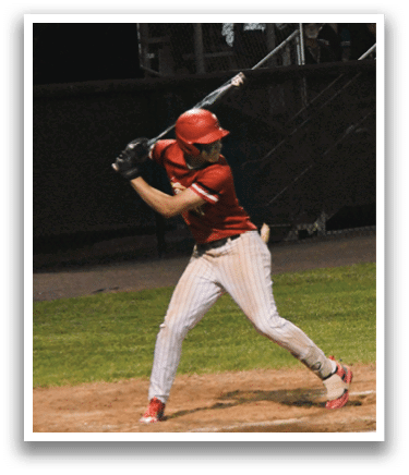 A baseball player is swinging a bat at a ball. Description generated by AI
