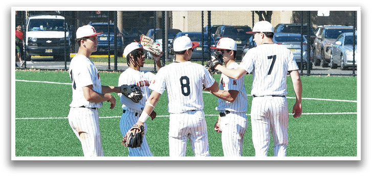 A group of baseball players on a field. Description generated by AI