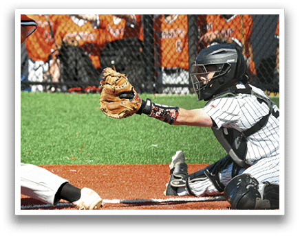 A baseball player is catching a ball. Description generated by AI