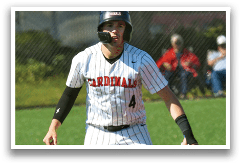 A baseball player wearing a white and red uniform. Description generated by AI