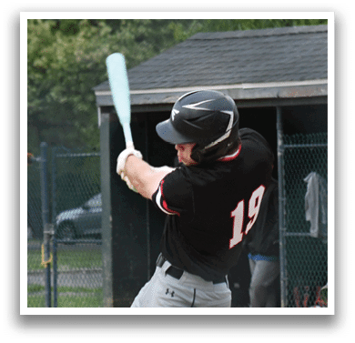 A baseball player is swinging a bat. Description generated by AI