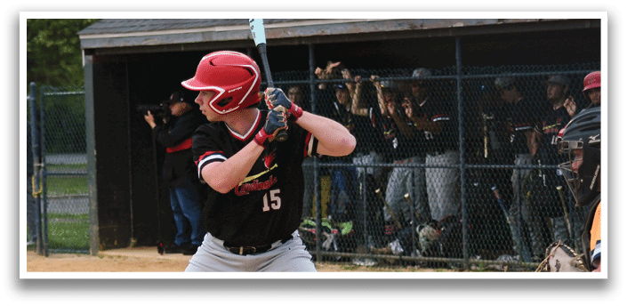A baseball player is swinging a bat at a ball. Description generated by AI