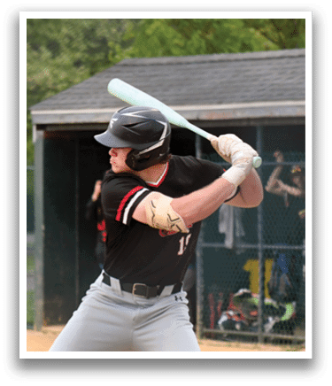 A baseball player is swinging a bat at a ball. Description generated by AI