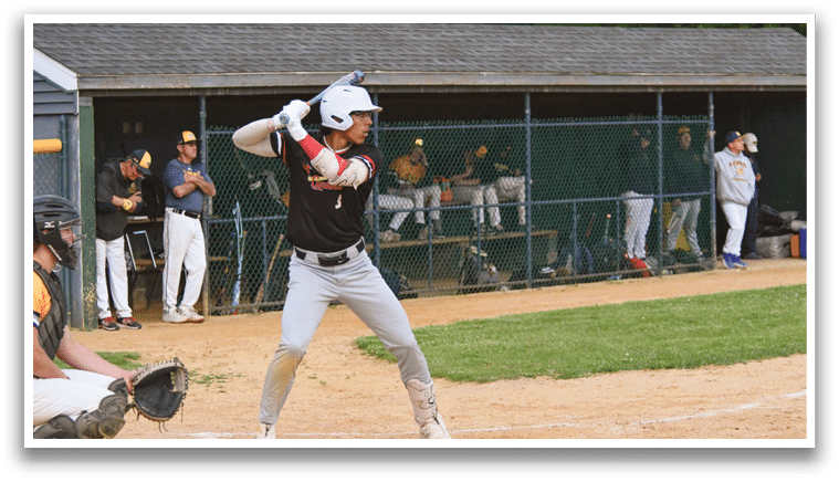 A baseball player is swinging a bat. Description generated by AI