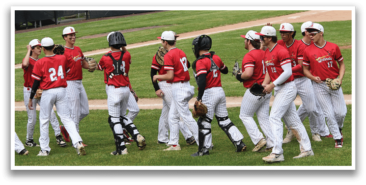 Baseball players wearing red shirts and white pants. Description generated by AI