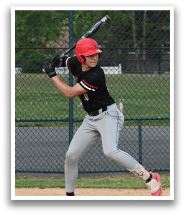 A baseball player is swinging a bat. Description generated by AI