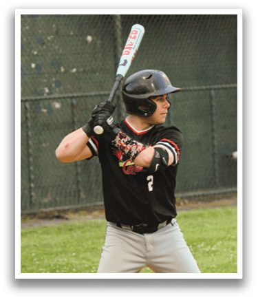 A baseball player in a black and white shirt is swinging a bat. Description generated by AI