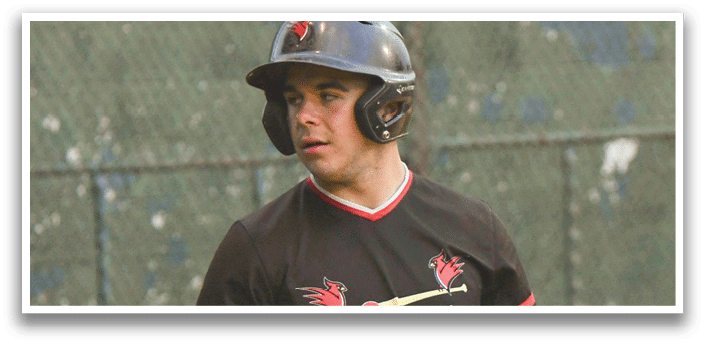 A baseball player wearing a black and red jersey. Description generated by AI