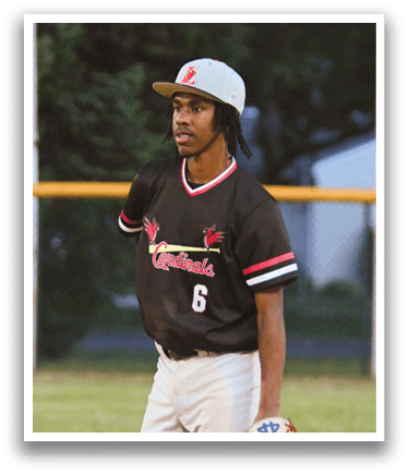 A baseball player wearing a black and red shirt and white pants. Description generated by AI