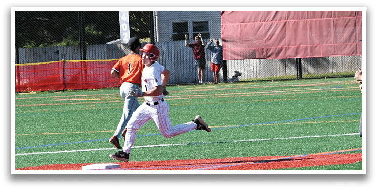 A baseball player running to first base. Description generated by AI