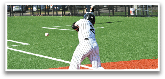 A baseball player is swinging a bat at a ball. Description generated by AI