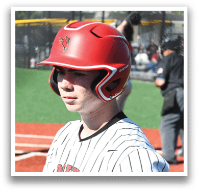 A baseball player wearing a red helmet. Description generated by AI
