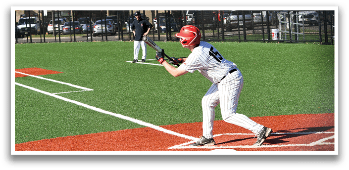A baseball player is swinging a bat at a ball. Description generated by AI