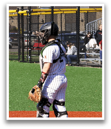A baseball player wearing a helmet and holding a mitt. Description generated by AI