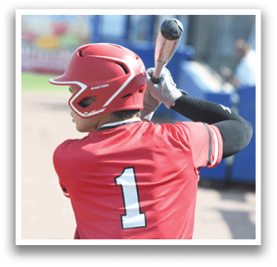 A baseball player wearing a red shirt with the number 1 on it. Description generated by AI