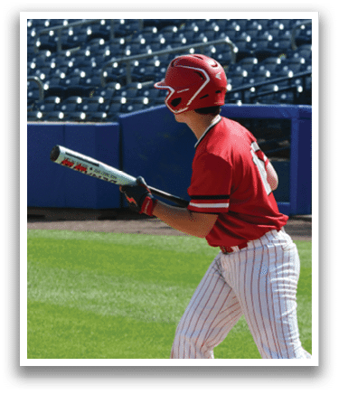 A baseball player holding a bat. Description generated by AI