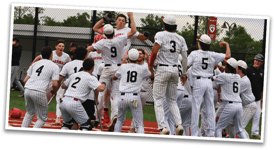 A group of baseball players celebrating a win. Description generated by AI