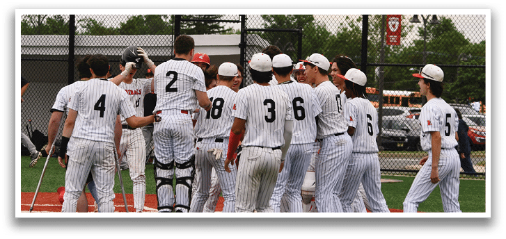 A group of baseball players celebrating on the field. Description generated by AI