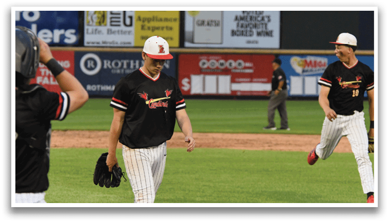 A baseball player wearing a red hat and black shirt. Description generated by AI