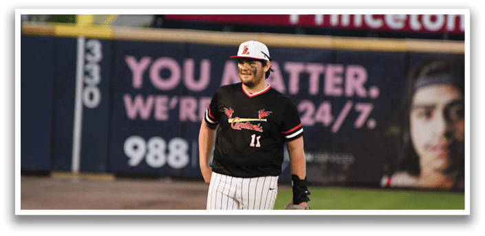 A baseball player wearing a black and white uniform. Description generated by AI