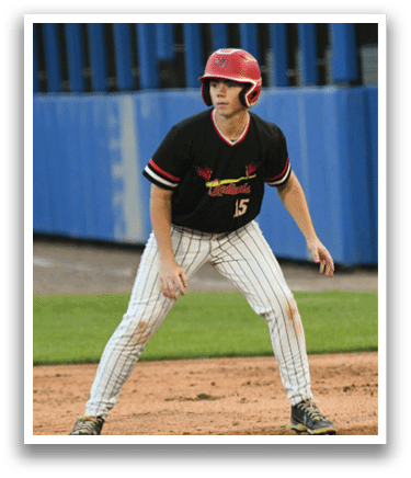 A baseball player wearing a red helmet and black shirt. Description generated by AI