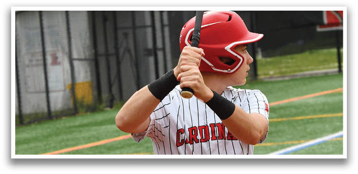 A baseball player is holding a bat and getting ready to swing. Description generated by AI