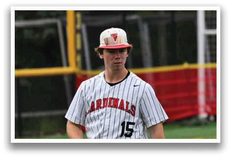 A baseball player wearing a Cardinals jersey. Description generated by AI