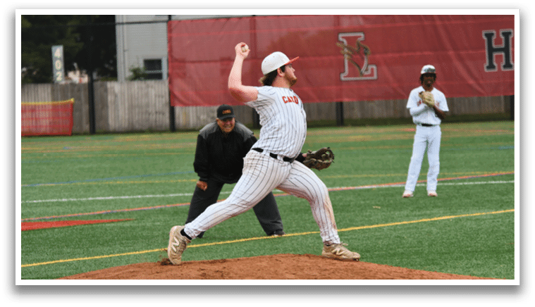 A baseball player in a white uniform is pitching a ball. Description generated by AI