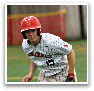 A baseball player wearing a red helmet and white uniform. Description generated by AI