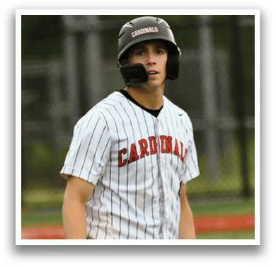 A baseball player wearing a black helmet and a white and black uniform. Description generated by AI
