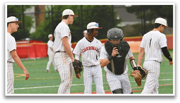 A group of baseball players on a field. Description generated by AI