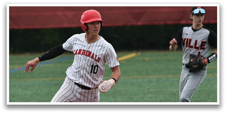 A baseball player wearing a red helmet and a black and white uniform. Description generated by AI