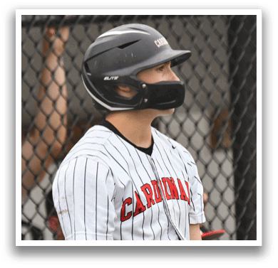 A baseball player wearing a black helmet. Description generated by AI